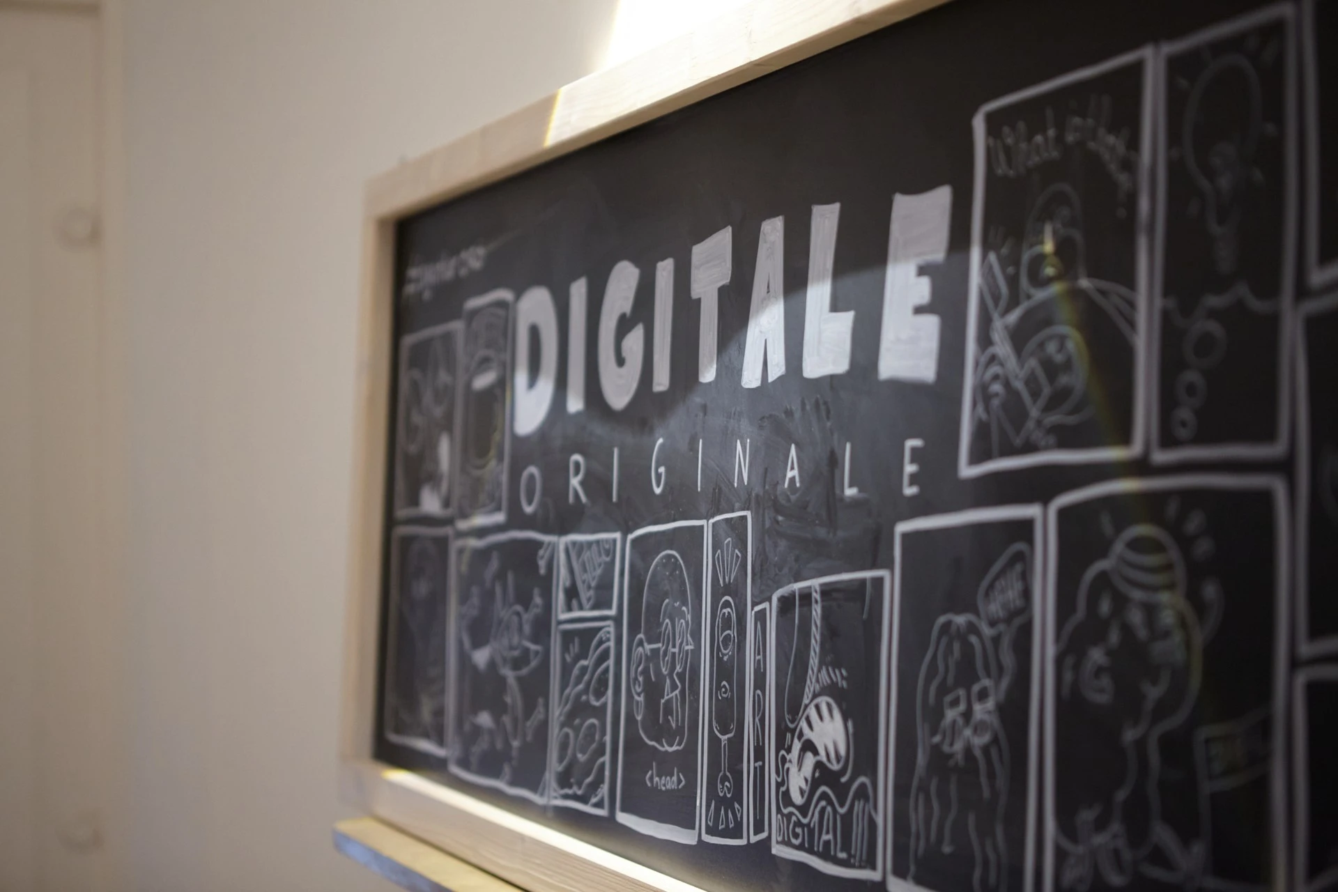 ORÖ Werbeagentur Agentur Impressionen Dortmund Büro Eingangsbereich Tafel "Digitale Originale" mit Illustrationen
